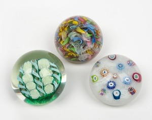 Three millefiori vintage&nbsp;glass paperweights, one bearing Murano paper label, the largest 6cm high, 7.5cm wide