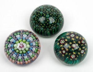Three assorted millefiori glass paperweights, one with acid etched mark "Millefiori, Factory, Murano", the largest 4cm high, 6.5cm wide