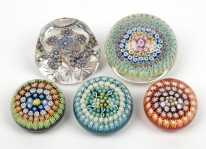 CRIEFF group of five Scottish millefiori glass paperweights including a faceted example, all bearing original labels, the largest 4cm high, 6.5cm wide