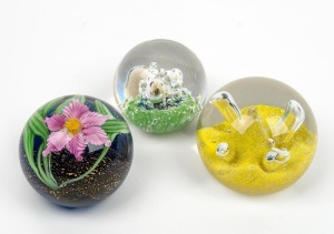 Three assorted art alass paperweights by Caithness, Grant Randolph and Kosta Boda, the largest 6.5cm high, 8cm wide