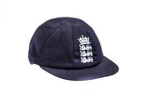 ALEC STEWART'S ENGLAND HOME TEST CAP, navy blue wool, embroidered Crown over Three Lions on front, named inside "Alec" & signed. Good match-used condition. [Alec Stewart played 133 Tests 1990-2003. He is the most capped English cricketer of all time in Te