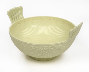 An antique English pressed glass fruit bowl, late 19th century, bearing diamond registration mark to base, 12cm high, 22.5cm wide