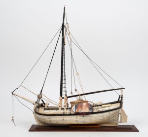 A scratch built vintage bone model boat, in the Napoleonic style, 20th century, ​​​​​​​50cm high, 45cm long
