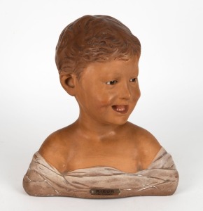 "RIEUR" De Donatello, antique fired chalkware bust of a child, with inset glass eyes, 19th/20th century, 33cm high