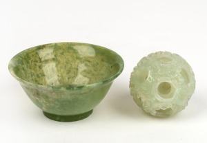 A Chinese carved jade puzzle ball, together with a jade tea bowl, (2 items), ​​​​​​​the ball 5cm diameter