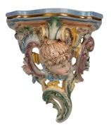 HUGO LONITZ&nbsp;pair of German porcelain wall brackets adorned with faces, 19th century, impressed double fish mark and stamped "Made In Germany", 34cm high - 2