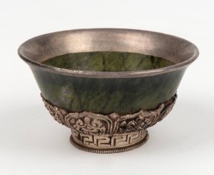 A Tibetan jade tea bowl with silver finished mounts, 19th/20th century, ​​​​​​​4cm high, 8cm diameter