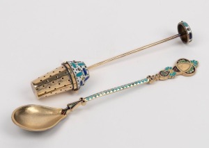 A fine quality Russian silver and enamel teaspoon, together with a Soviet era Russian silver tea brewing spoon with enamel decoration, (2 items), 12.5cm and 11cm long,