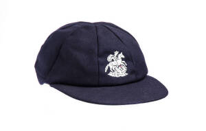 JOHN EMBUREY'S ENGLAND TOURING TEST CAP, navy blue wool, embroidered St.George & Dragon on front, named inside "J.E.Emburey". Good match-used condition. [John Emburey played 64 Tests & 61 ODIs 1978-95].