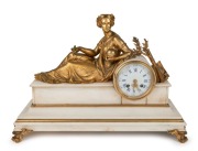 An antique French mantle clock with&nbsp;white marble case mounted with reclining ormolu female figure, eight day time and strike movement with Roman numerals, 19th century, ​​​​​​​32cm high, 47cm wide