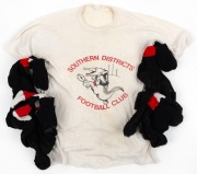 ex NATHAN BUCKLEY COLLECTION:&nbsp;Southern Districts Football Club white T-shirt with caricatured crocodile kicking a footy.&nbsp;