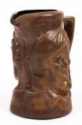 A 1977 centenary test commemorative jug depicting Greg Chappell and Tony Greig (the opposing captains)&nbsp;from a limited edition by Bendigo Pottery; numbered 79/300, with certificate. 17cm high. - 2