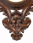 An impressive antique French aneroid wall barometer with exposed movement, housed in carved walnut surround, dial marked "Mon. LOISEAE. BOUCHAR, Sr. 35. QUAI DE L'HORLOGE, PARIS", 19th century, 91 x 62cm overall - 3