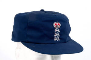 ALEC STEWART'S ENGLAND HOME TEST CAP, baseball-style, navy blue, embroidered Crown over Three Lions on front, signed on the brim "Alec Stewart". Good match-used condition. [Alec Stewart played 133 Tests 1990-2003].