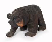 A Black Forest style carved timber bear statue, 20th century, ​​​​​​​38cm high, 58cm long - 2