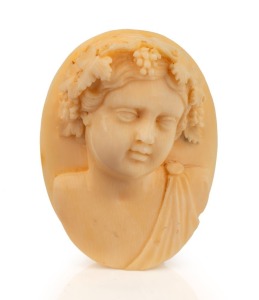 An antique French Dieppe carved ivory brooch with classical portrait, 19th century, ​​​​​​​5.2cm high