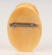 An antique French Dieppe carved ivory brooch with classical portrait, 19th century, ​​​​​​​5.2cm high - 2