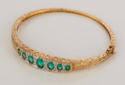 An antique 9ct gold bracelet, set with diamonds and green stones, 19th century, stamped "375", 6.5cm wide, (6cm wide internally), 14.2 grams total - 2