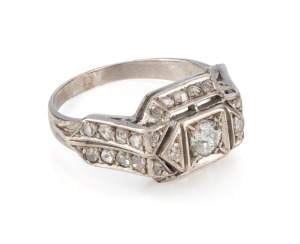 An Art Deco 18ct white gold and white diamond ring, circa 1930s, 3.5 grams