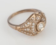 An Art Deco 18ct white and yellow gold ring, set with brilliant cut white diamonds, 2.7 grams - 2