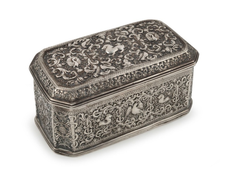 An antique Burmese silver betel box with ornate chased and repousse decoration, 19th/20th century, 8cm high, 15cm wide, 8.5cm deep, 430 grams