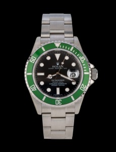 ROLEX "SUBMARINER" Oyster Perpetual Date wristwatch in stainless steel case with green rotating bezel and black dial, near mint condition, with original box, papers and swing tags, 4.5cm wide including crown