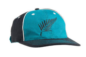 NEW ZEALAND CRICKET CAP, baseball-style, teal & black with Silver Fern logo on front, player unknown. G/VG condition.