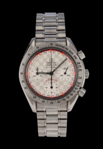 OMEGA "SPEEDMASTER" MICHAEL SCHUMACHER edition (639/4000) automatic chronograph wristwatch in stainless steel case with chequered dial with florescent hour batons, with box and papers, 4.1cm wide including crown
