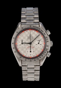 OMEGA "SPEEDMASTER" MICHAEL SCHUMACHER edition (639/4000) automatic chronograph wristwatch in stainless steel case with chequered dial with florescent hour batons, with box and papers, 4.1cm wide including crown