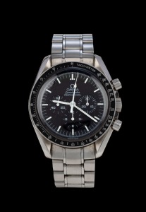 OMEGA "SPEEDMASTER PROFESSIONAL" automatic chronograph wristwatch in stainless steel case with black dial, white baton numerals and black tachymeter, in an Omega branded timber finished case, 4.4cm wide including crown