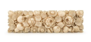 An antique ivory buckle, beautifully carved with floral decoration, 19th century, ​​​​​​​9cm high