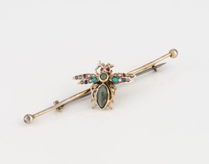 An antique gilt silver bug brooch, set with seed pearls and polished stones, 19th century, 7.7cm wide