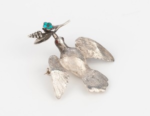 An antique silver and turquoise dove brooch, mid 19th century, 4.5cm wide