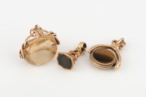 Three antique 9ct gold mounted fobs, all set with stones, 19th century, ​​​​​​​the largest 3cm high, 13.6 grams total including stones