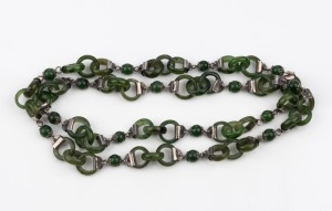 An antique Chinese jade and silver necklace, early 20th century, 71cm long