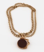 An antique 9ct gold fob chain with a 9ct gold bloodstone and carnelian swivel fob, 19th century, 57cm long, the chain 38.3 grams - 2