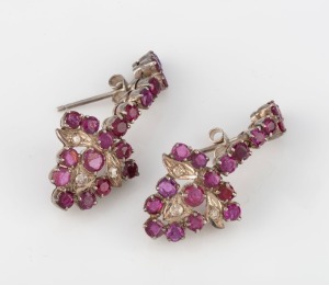 A pair of 18ct white gold, ruby and diamond drop earrings, 3.3 cm high, 6.8 grams