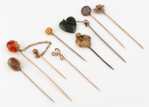 Eight assorted antique 9ct and 15ct gold stickpins, set with assorted stones, 19th and early 20th century, the largest 8.5cm high, 16.9 grams total