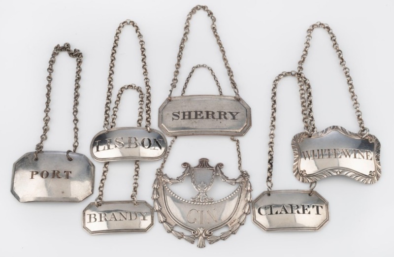 DECANTER LABELS group of seven Georgian sterling silver examples, 