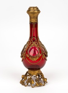 An antique French ruby glass decanter in ornate gilt metal mounts, 19th century, ​​​​​​​25cm high