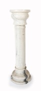 An antique white marble pedestal with turned column, 20th century, 101cm high