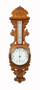 236 · An antique English aneroid wheel barometer in carved oak case with 8" ceramic dial and mercurial thermometer box, 19th century, ​​​​​​​90cm high