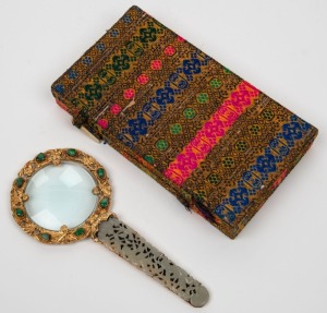 A Chinese magnifying glass, silver gilt with cabochon jade and carved mutton jade handle, early 20th century, 15.5cm long