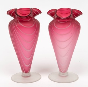 A pair of cranberry satin glass mantle vases with white swirling inclusions, early 20th century, ​​​​​​​23cm high