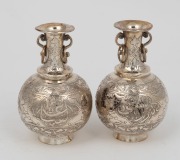 A pair of Indo-Persian silver posy vases with calligraphic engraved decoration, 20th century, 9cm high, 135 grams total - 2