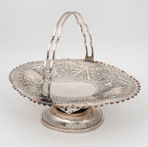 An antique Chinese export silver basket with pierced floral decoration, 19th,20th century, double seal mark to base, 24cm high, 29.5cm wide, 622 grams