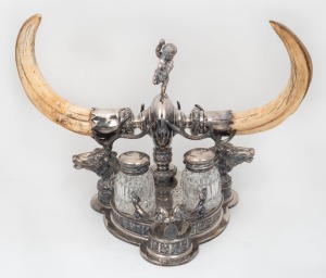 An impressive antique English silver plated trophy desk set adorned with stag's heads with mounted tusks, engraved "PRESENTED BY S.W. GIBSON TO THE WHITTLESEA SHIRE RIFLE CLUB, YEAR 1900 WON BY CAPTAIN FRANCIS K. PHILLIPS", ​​​​​​​28cm high, 40cm wide