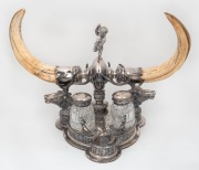 An impressive antique English silver plated trophy desk set&nbsp;adorned with stag's heads with mounted tusks, engraved "PRESENTED BY S.W. GIBSON TO THE WHITTLESEA SHIRE RIFLE CLUB, YEAR 1900 WON BY CAPTAIN FRANCIS K. PHILLIPS", ​​​​​​​28cm high, 40cm wide