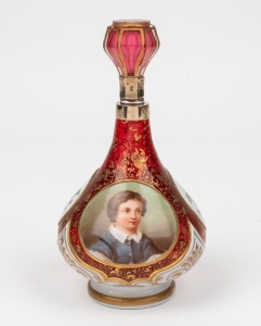 An antique Bohemian ruby overlay flagon with enamel portrait and floral vignettes, adorned with gilded silver mounts, 19th century, ​​​​​​​18cm high