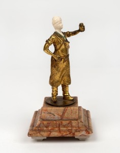 An antique gilt bronze and carved ivory statue on marble base, early 20th century, 28cm high